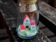message and miniature in a bottle